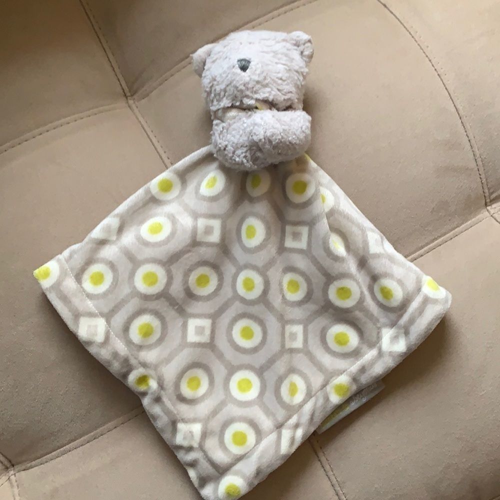 Toddler stuffed animal with attached blanket